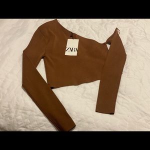 Asymmetric cropped top